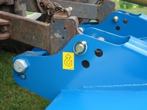 Unique three point linkage hitch system allows the Topper to slide easily over the field surface.